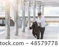 businessman in a hurry and running, he is late 48579778