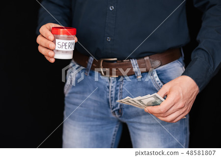 sperm Bank and earn money to bills in hands 48581807