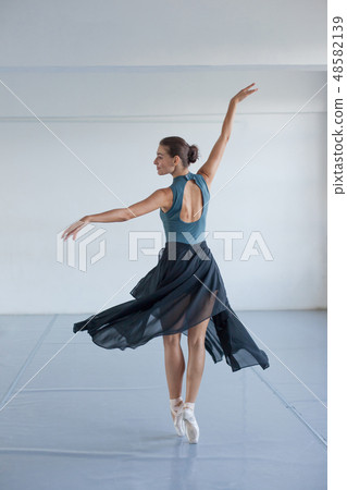 Ballerina spinning in the dance. 48582139