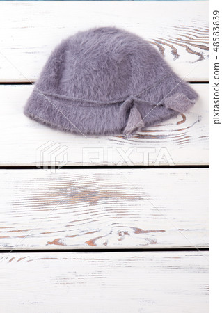 Female winter hat, copy space. Female winter hat, copy space. 48583839