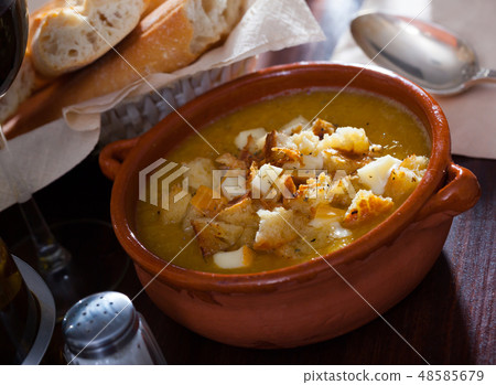 Cream soup with croutons and cheese Cream soup with croutons and cheese 48585679