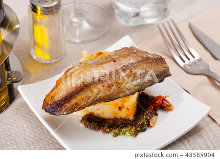 Mackerel fillet with mashed potatoes and spices Mackerel fillet with mashed potatoes and spices 48585904