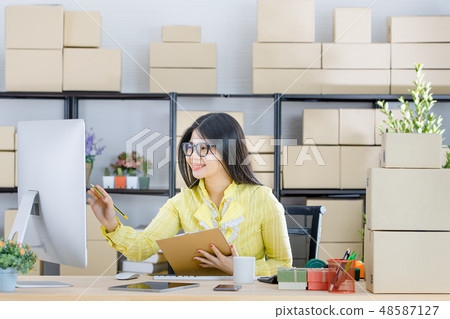 Business woman working in start up office 48587127