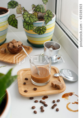 Alternating filter manual brewing of coffee  48589303