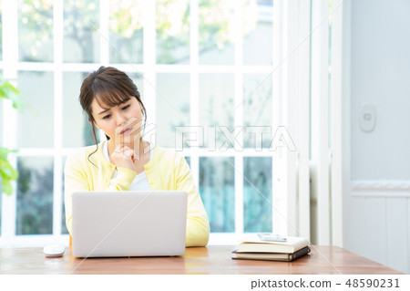 Young lady who operates personal computer internet girls lifestyle female portrait Young lady who operates personal computer internet girls lifestyle female portrait 48590231