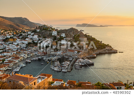 Views of Marina of the Hydra island in twilight. Aegean sea, Greece. 48590302