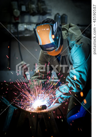 industrial worker welding industrial worker welding 48590587