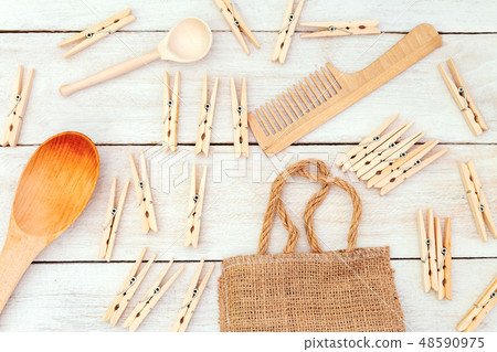 Wooden items on a wooden background. Zero waste Wooden items on a wooden background. Zero waste 48590975