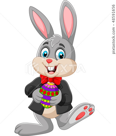 Easter Bunny holding Easter egg 48591656