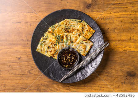 Chijimi Korean gourmet Asian Okonomiyaki jijim and iron pan Korean food 48592486