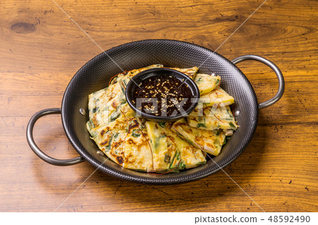 Chijimi Korean gourmet Asian Okonomiyaki jijim and iron pan Korean food 48592490