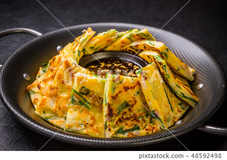 Chijimi Korean gourmet Asian Okonomiyaki jijim and iron pan Korean food 48592498