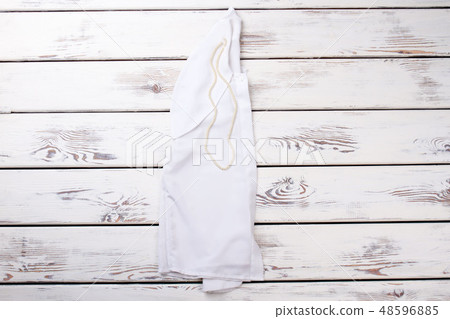 Female white blouse and pearl beads. 48596885