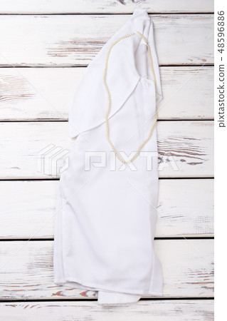 Women white shirt on wooden background. 48596886