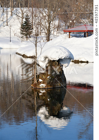 Shooting the landscape of the spring water spout spring water park in Hokkaido Kyogoku-cho in early spring Shooting the landscape of the spring water spout spring water park in Hokkaido Kyogoku-cho in early spring 48597391