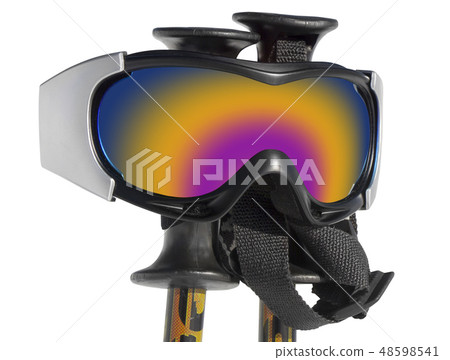 Ski goggles on ski sticks isolated on white back 48598541
