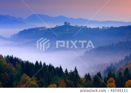 Twilight with fog in Slovenia. Saint Thomas Church Twilight with fog in Slovenia. Saint Thomas Church 48599131