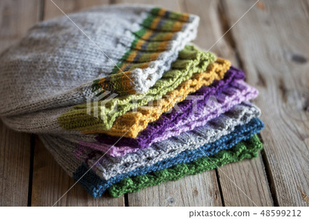 Multicolor knitted hats stack Multicolor knitted hats stack 48599212