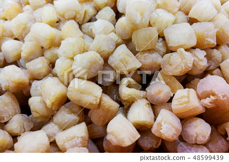 Heap of dried scallop.  48599439