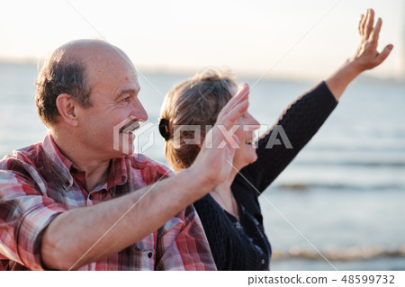 Portrait of a happy romantic couple outdoors. 48599732