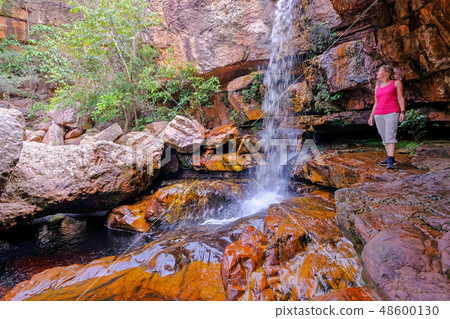 Woman hiker at Cachoeira Da Primavera, Spring Waterfall, Rio Lencois river, Chapada Diamantina 48600130