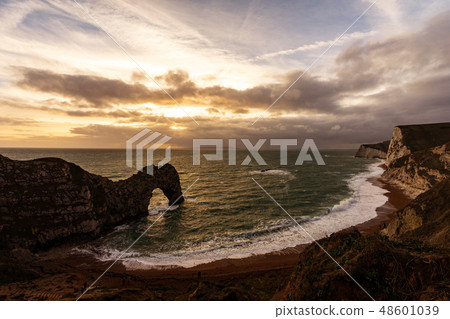 England's Dorset in the UK and Durhdore's Natural Bridge on the Jurassic Coast on the coast of East Devon England's Dorset in the UK and Durhdore's Natural Bridge on the Jurassic Coast on the coast of East Devon 48601039