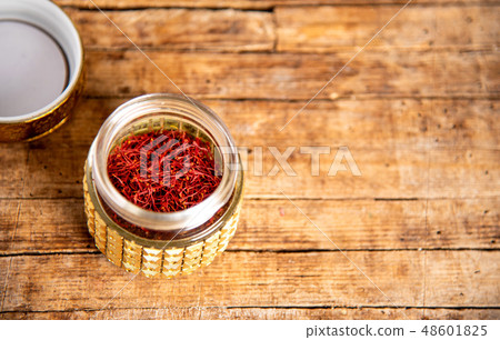 Saffron spice tea crop in a traditional box Saffron spice tea crop in a traditional box 48601825