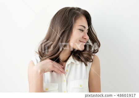 Serious Woman looking away Serious Woman looking away 48601917