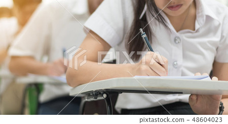 School exam, education concept student taking test 48604023