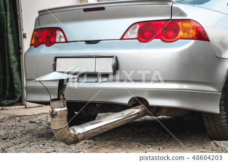 Ridiculous exhaust pipe on the car Ridiculous exhaust pipe on the car 48604203