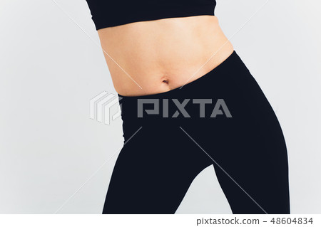 Women's black fitness pant isolated on white background with clipping path. Front view. Women's black fitness pant isolated on white background with clipping path. Front view. 48604834