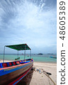 A tropical boat and a blue sky 48605389