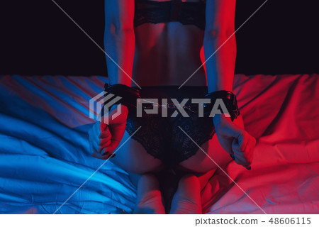 booty girl with sexy body handcuffed in lingerie on bed booty girl with sexy body handcuffed in lingerie on bed 48606115