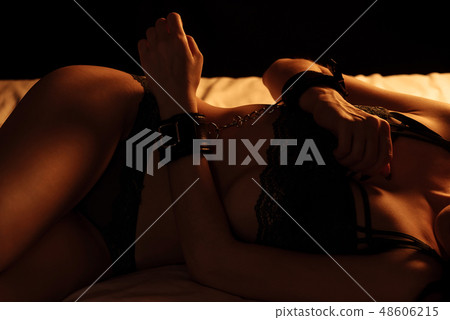 body of a sexy girl in underwear on bed with Stock Photo