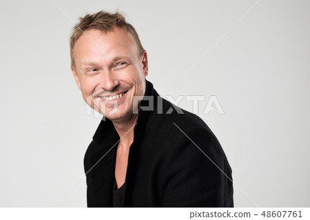 Smiling young man Smiling young man 48607761