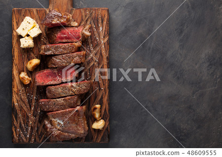 Closeup ready to eat steak new York. 48609555