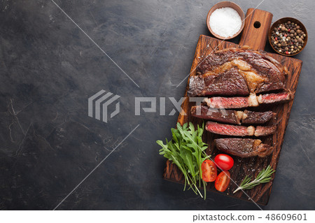Grilled ribeye beef steak. Grilled ribeye beef steak. 48609601