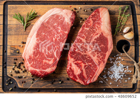 Fresh raw Prime Black Angus beef steaks. Fresh raw Prime Black Angus beef steaks. 48609652