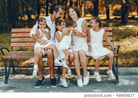 Big family playing in a summer park Big family playing in a summer park 48609837