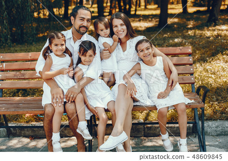 Big family playing in a summer park Big family playing in a summer park 48609845