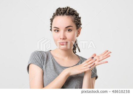 Portrait of smiling caucasian woman with braids 48610238