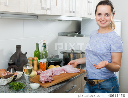 woman cooking rabbit 48611458