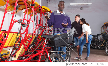 African-American man recommending rickshaw African-American man recommending rickshaw 48611469