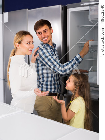 family selecting refrigerator family selecting refrigerator 48612340