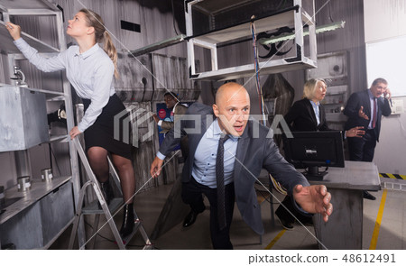 Anxious businessman running 48612491
