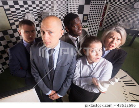 Men and women in pensive poses Men and women in pensive poses 48612696