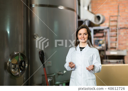 Operator in olive oil factory. 48612726