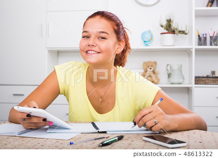 positive girl studying positive girl studying 48613322