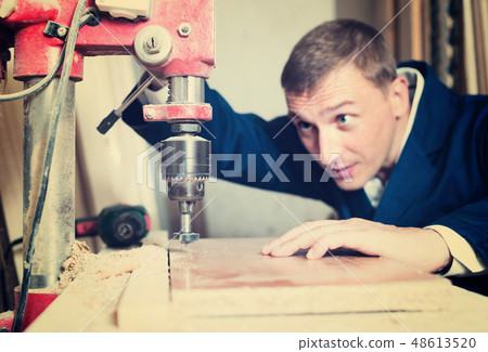 workman drilling planks workman drilling planks 48613520