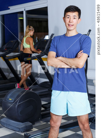 Portrait of confident athletic male trainer Portrait of confident athletic male trainer 48615499
